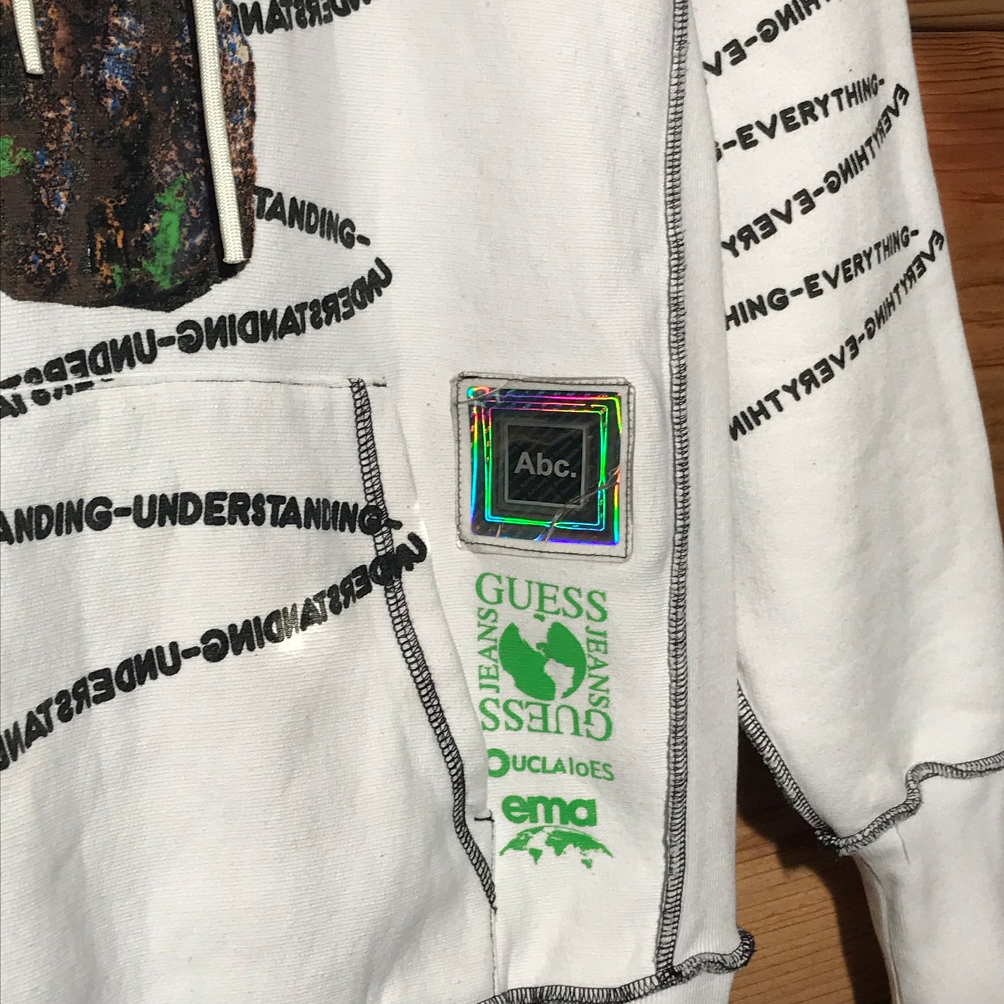 Advisory Board Crystals x Guess Jeans Planet Saving Information hoodie