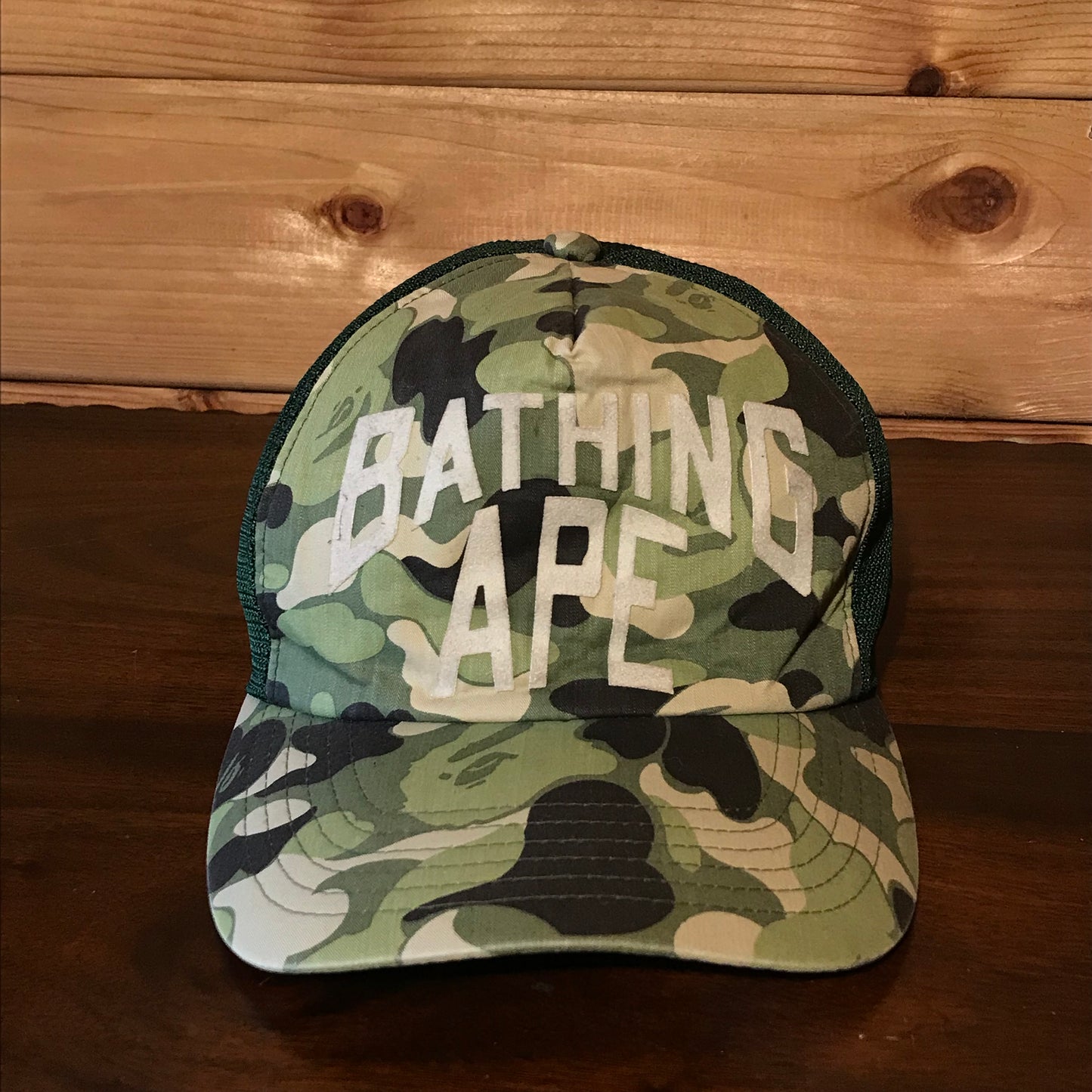 Bape, A Bathing Ape Arc Spellout Green Camo trucker cap