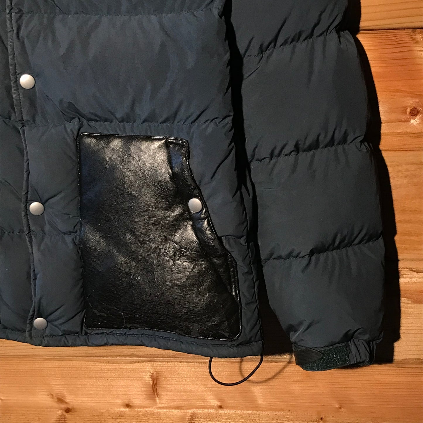 Undercover x Uniqlo Leather Panelled puffer jacket