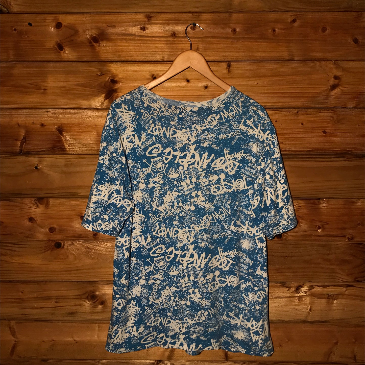 Stüssy International World Tour Scattered Spellouts AOP t shirt