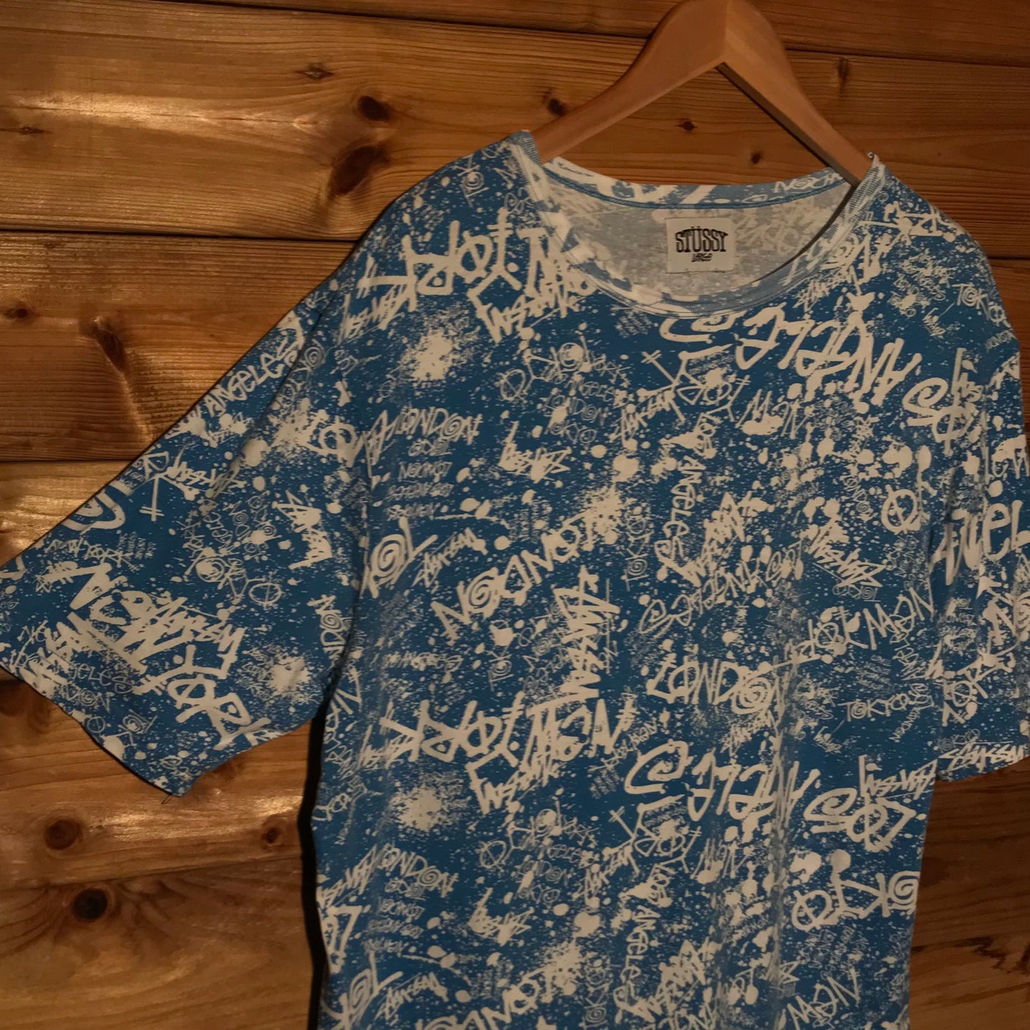 Stüssy International World Tour Scattered Spellouts AOP t shirt