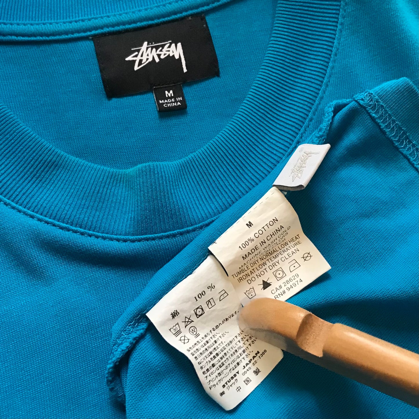 Stüssy Upside Down Script Spellout t shirt