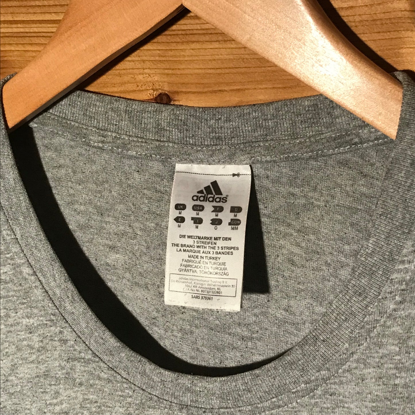Adidas Global Comix Group Trampled Trainers t shirt