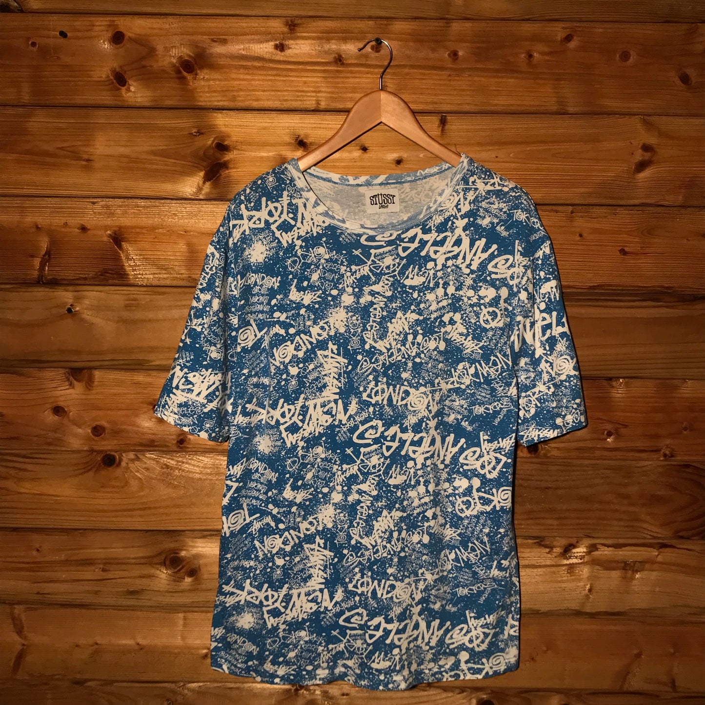 Stüssy International World Tour Scattered Spellouts AOP t shirt