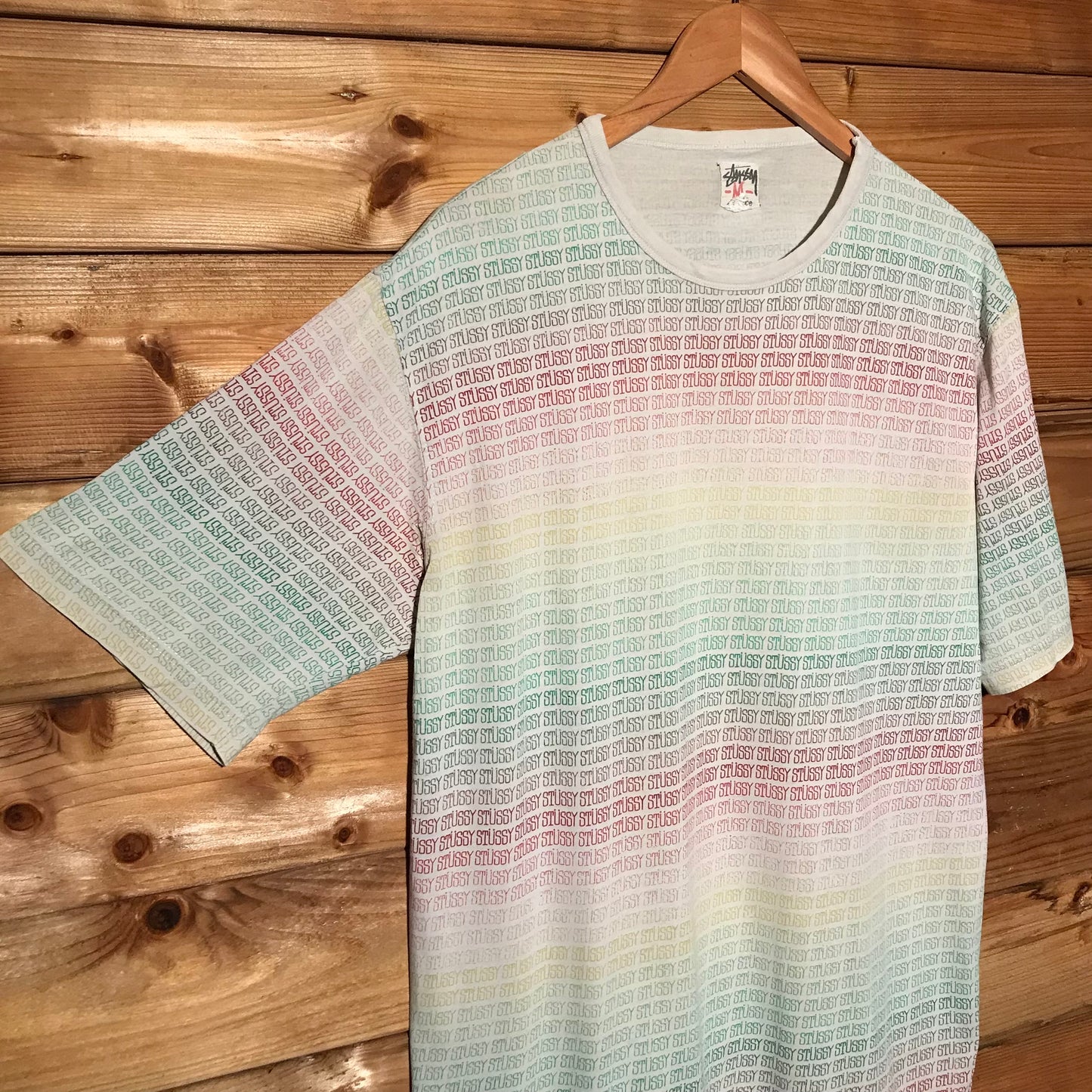 Stüssy Rainbow Gradient Spellouts AOP t shirt