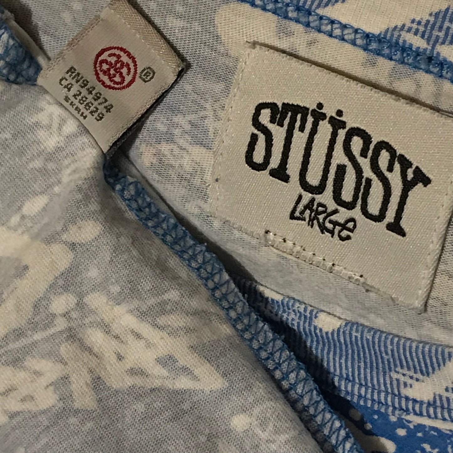 Stüssy International World Tour Scattered Spellouts AOP t shirt