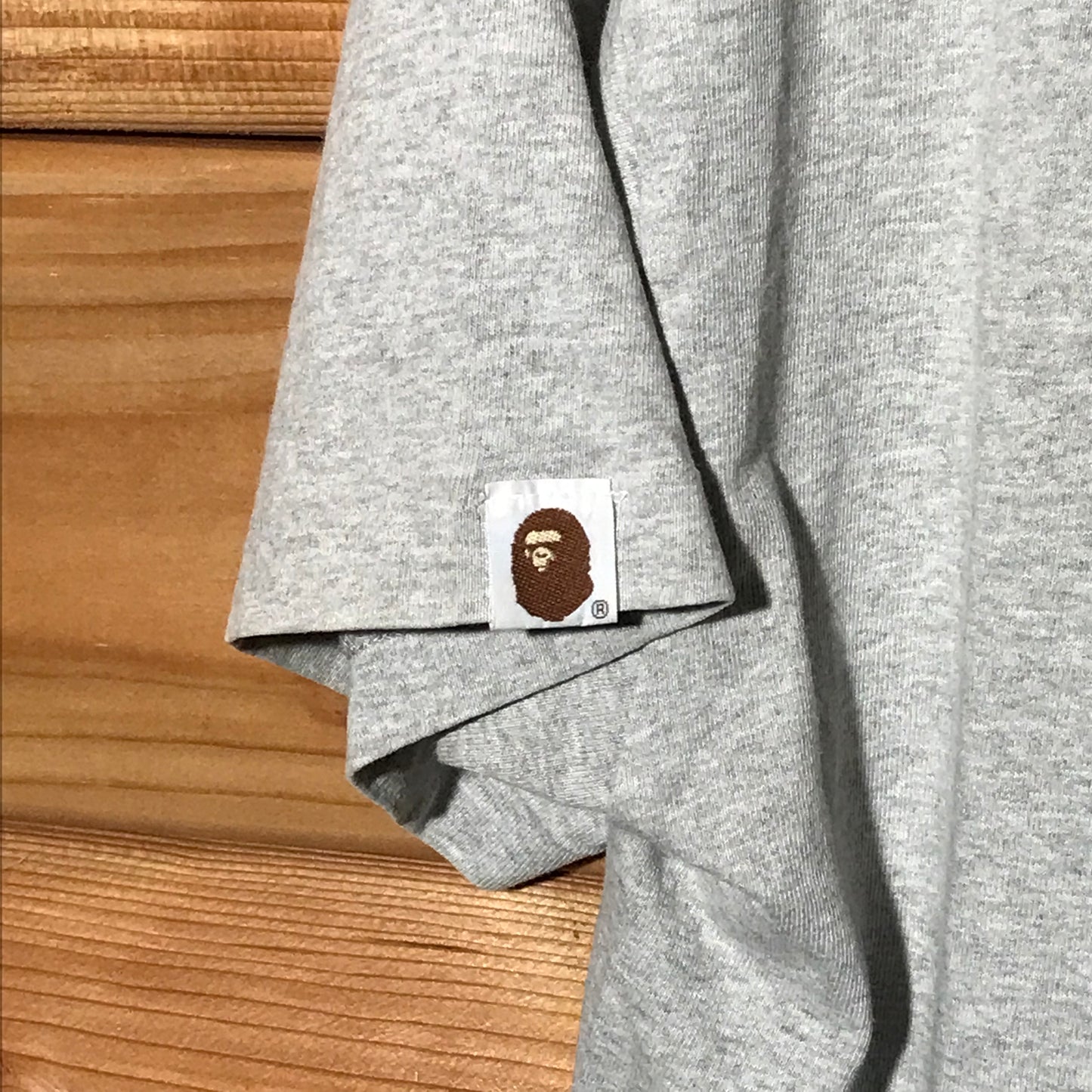 Bape, A Bathing Ape x Kaws Spellout t shirt
