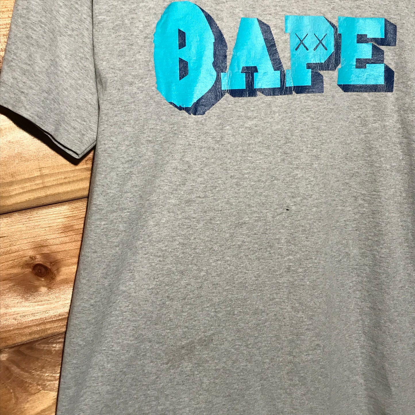 Bape, A Bathing Ape x Kaws Spellout t shirt