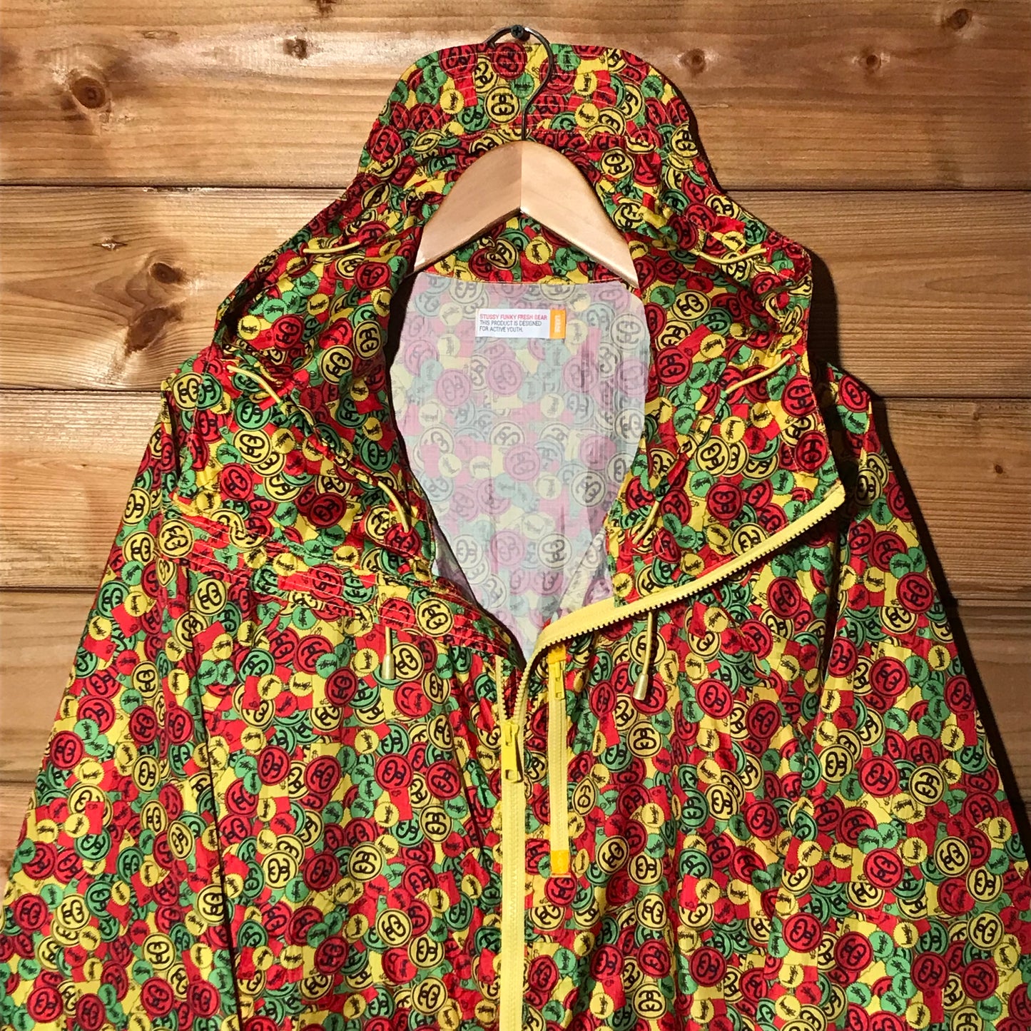 Stüssy Rasta Dollar Link Logo AOP windbreaker jacket