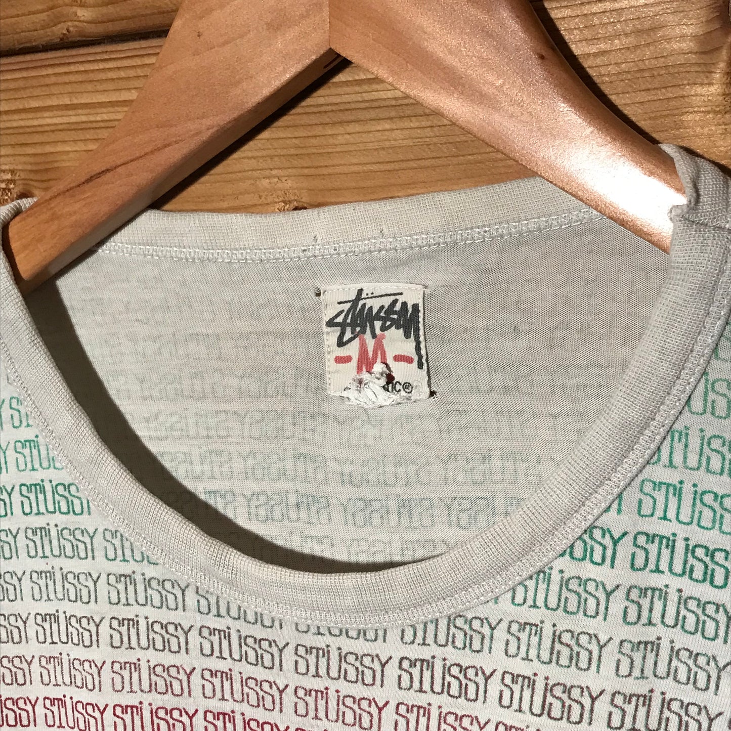 Stüssy Rainbow Gradient Spellouts AOP t shirt