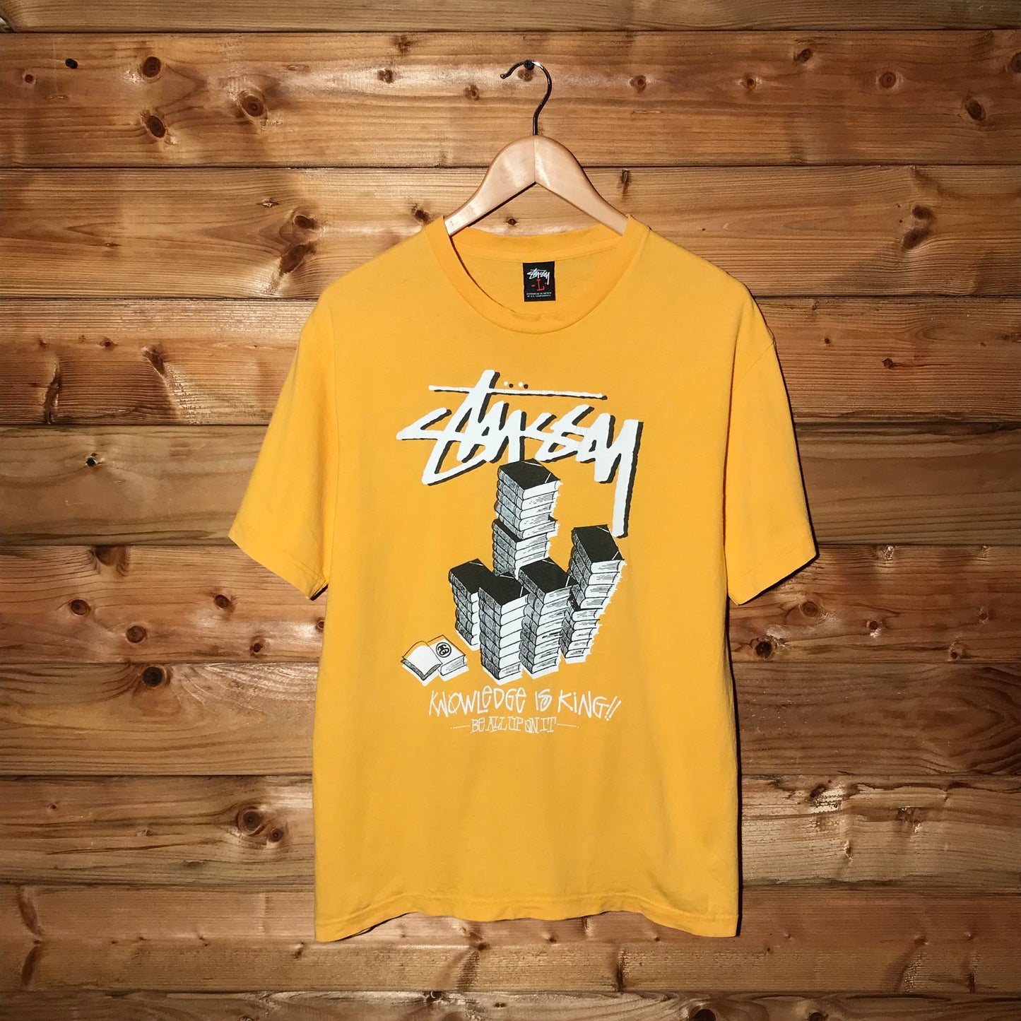 Stüssy Knowledge Is King Book Pile Script Spellout t shirt