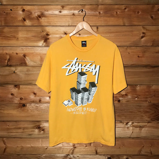 Stüssy Knowledge Is King Book Pile Script Spellout t shirt