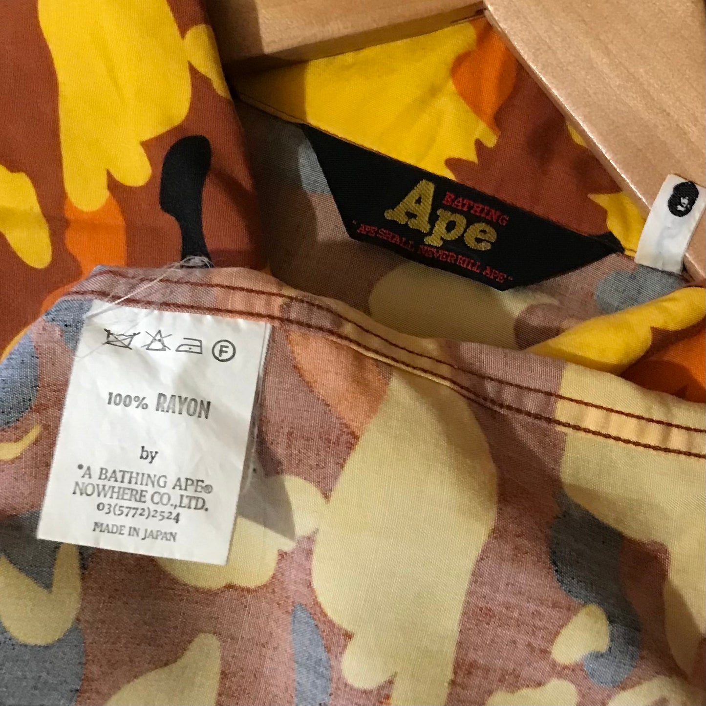 Bape, A Bathing Ape Orange Camo AOP button up shirt