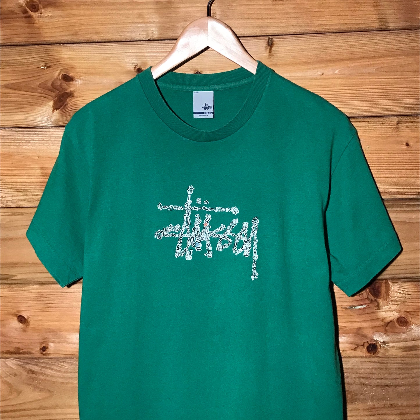 Stüssy Newspaper Clippings Script Spellout t shirt