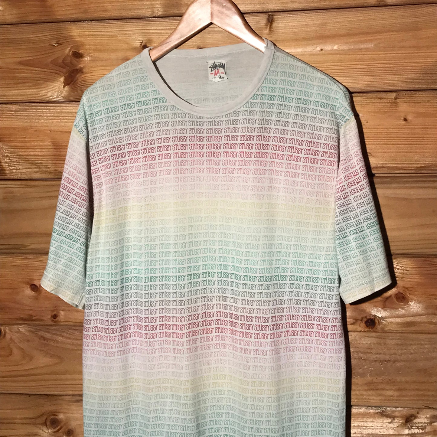 Stüssy Rainbow Gradient Spellouts AOP t shirt