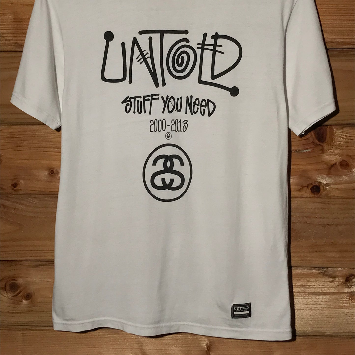 2013 Stüssy x UNTOLD Stuff You Need Centre Spellout t shirt