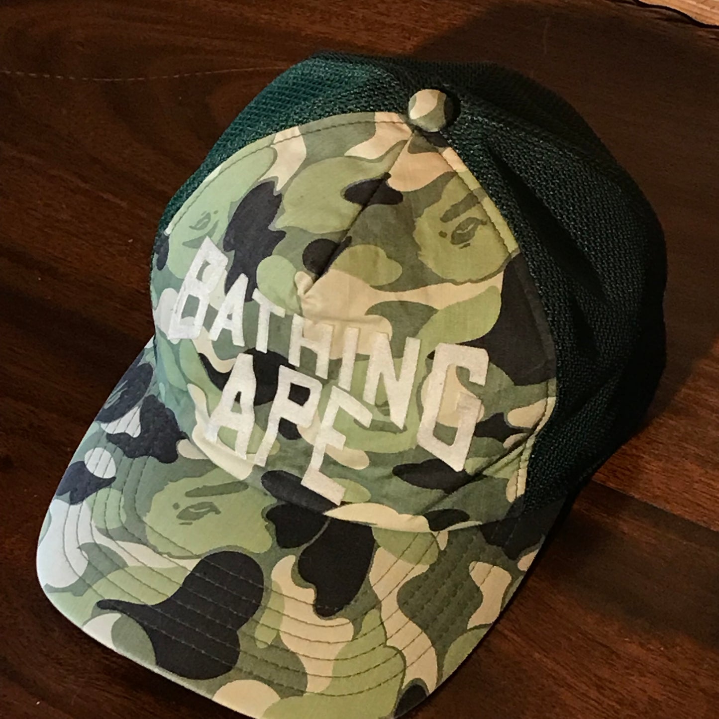 Bape, A Bathing Ape Arc Spellout Green Camo trucker cap