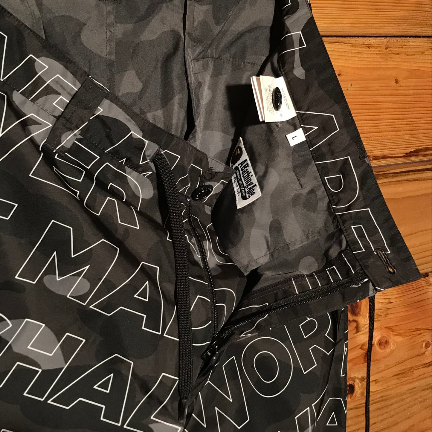 Bape, A Bathing Ape Text Colour Black Camo trousers