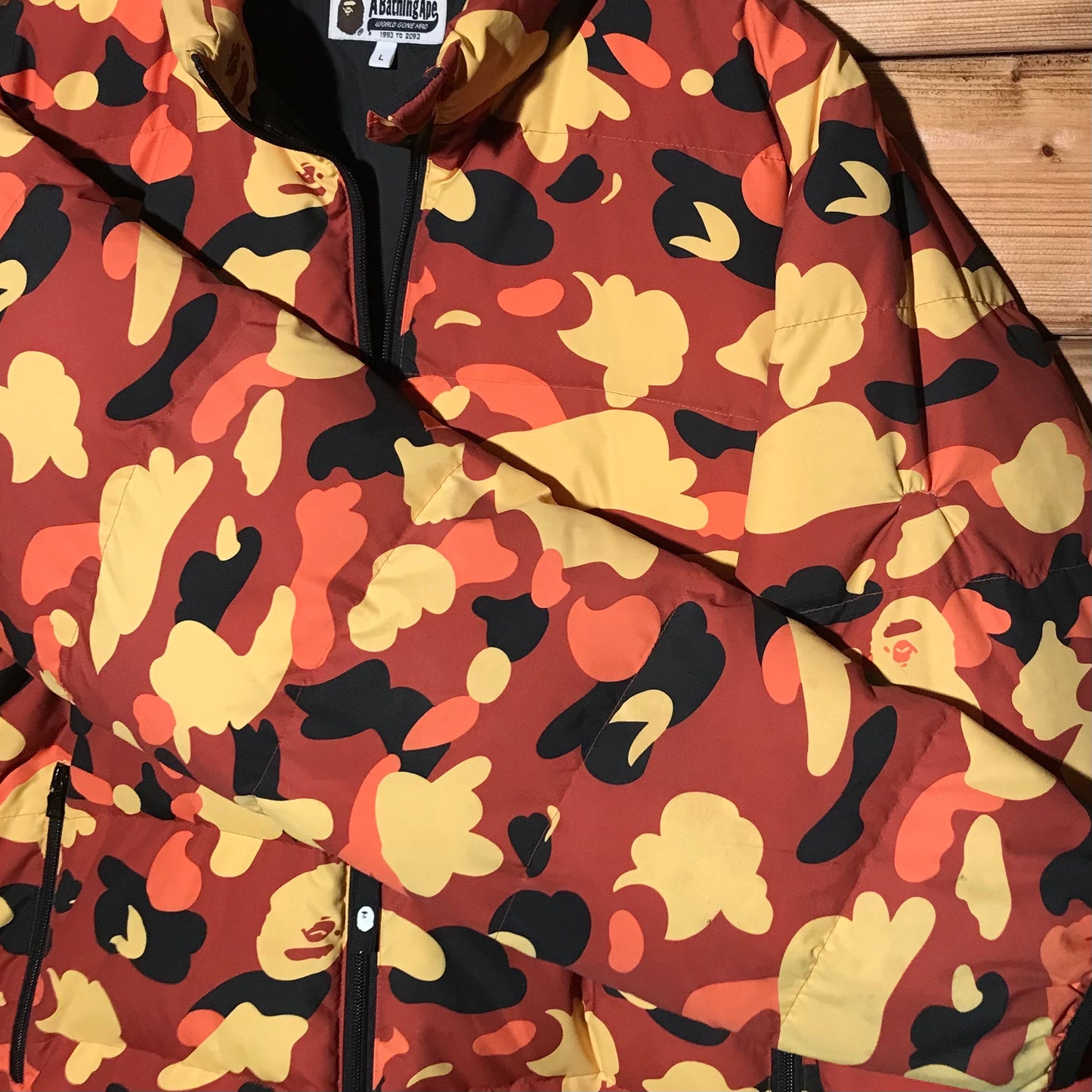 Bape, A Bathing Ape Orange Camo puffer jacket