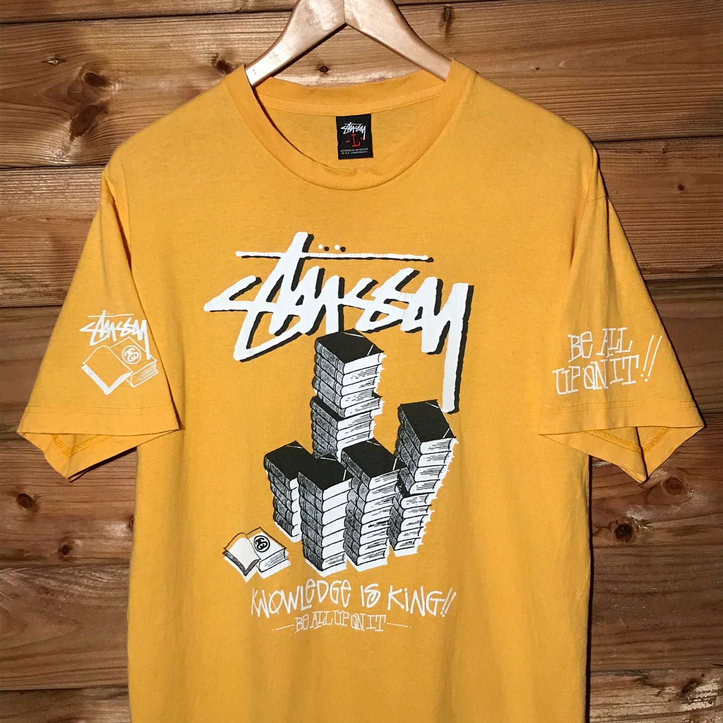 Stüssy Knowledge Is King Book Pile Script Spellout t shirt