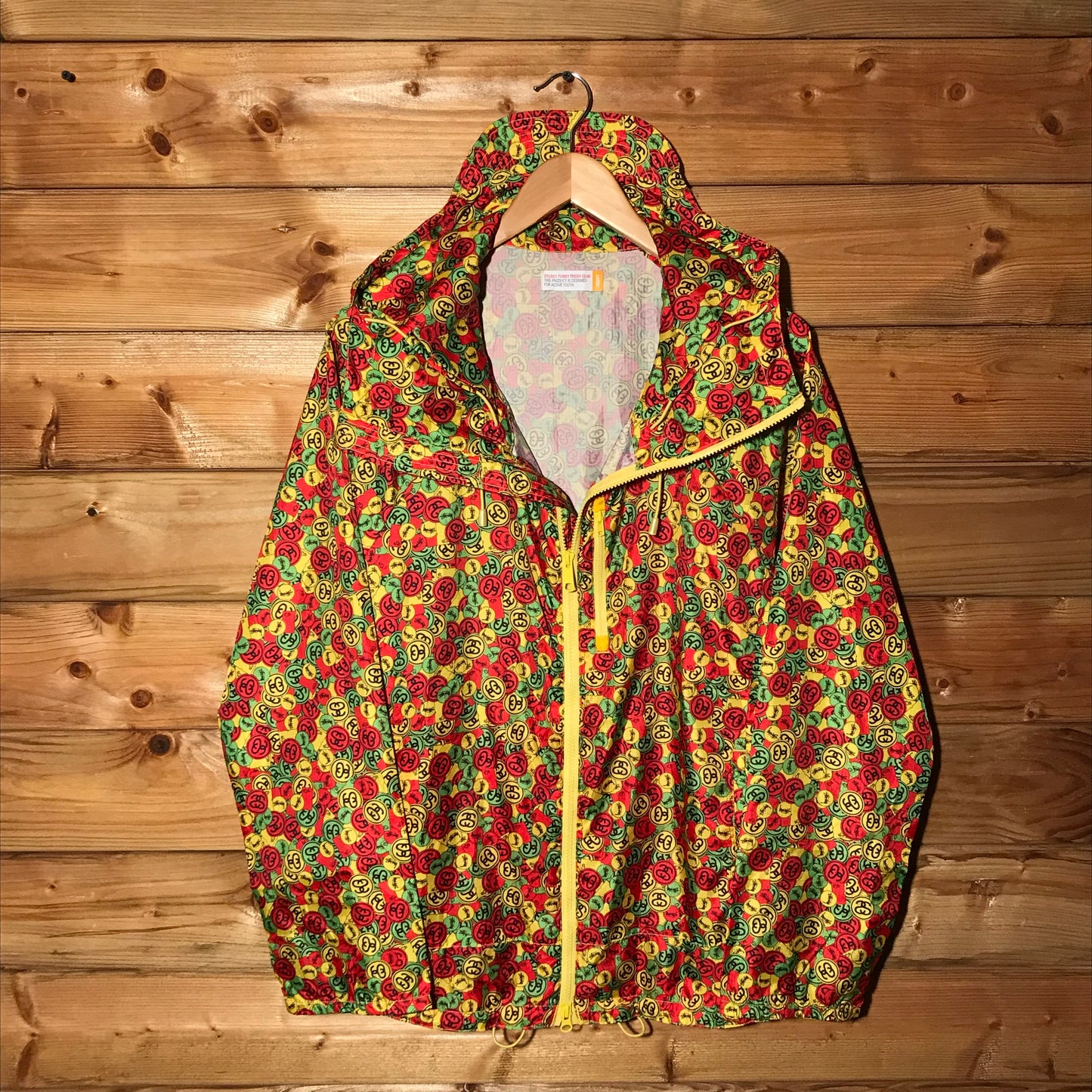 Stüssy Rasta Dollar Link Logo AOP windbreaker jacket