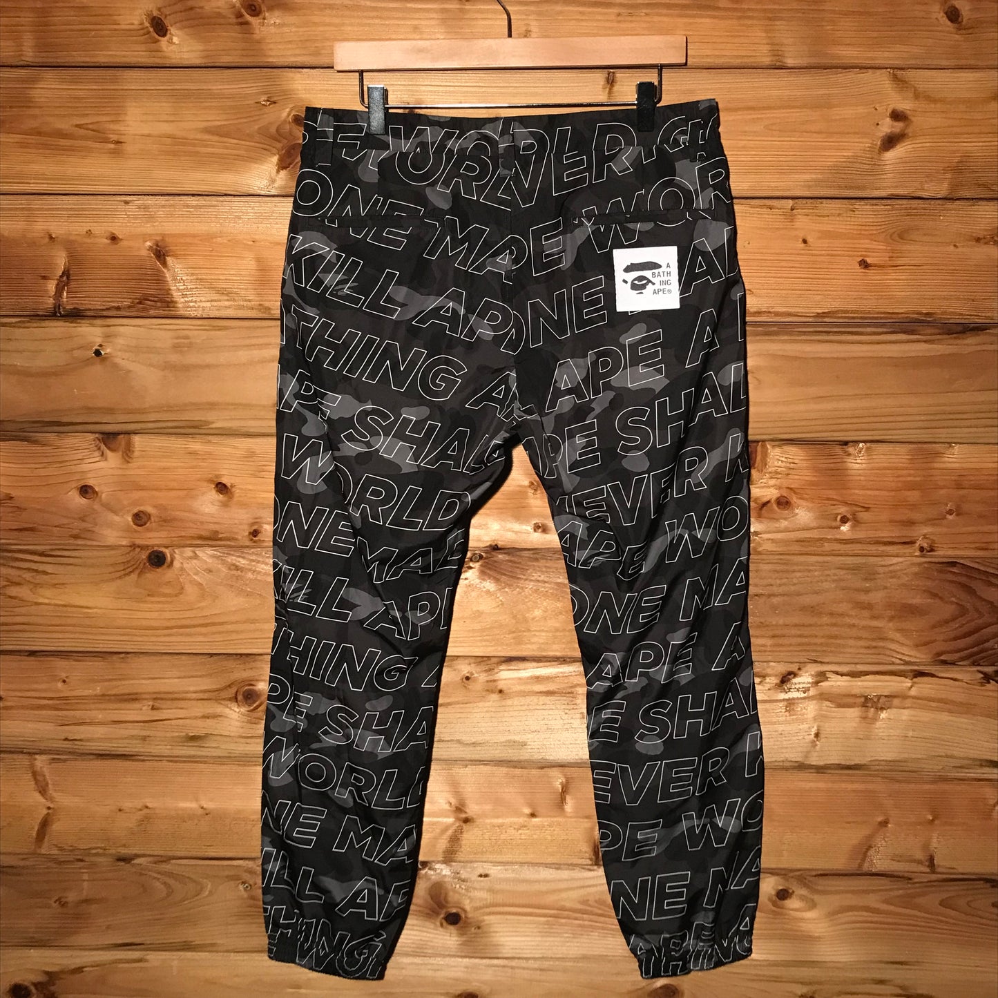 Bape, A Bathing Ape Text Colour Black Camo trousers