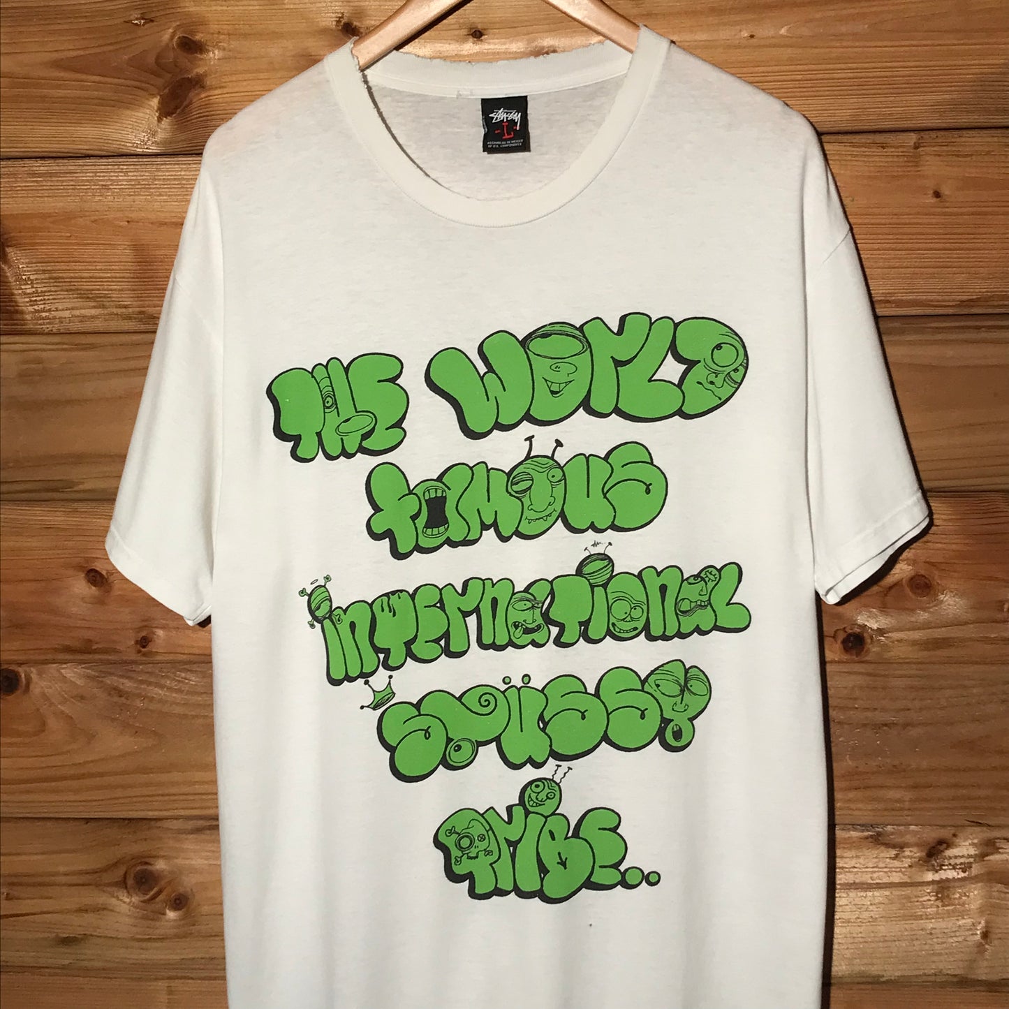 Stüssy x Ghost World Famous Tribe Spellout t shirt