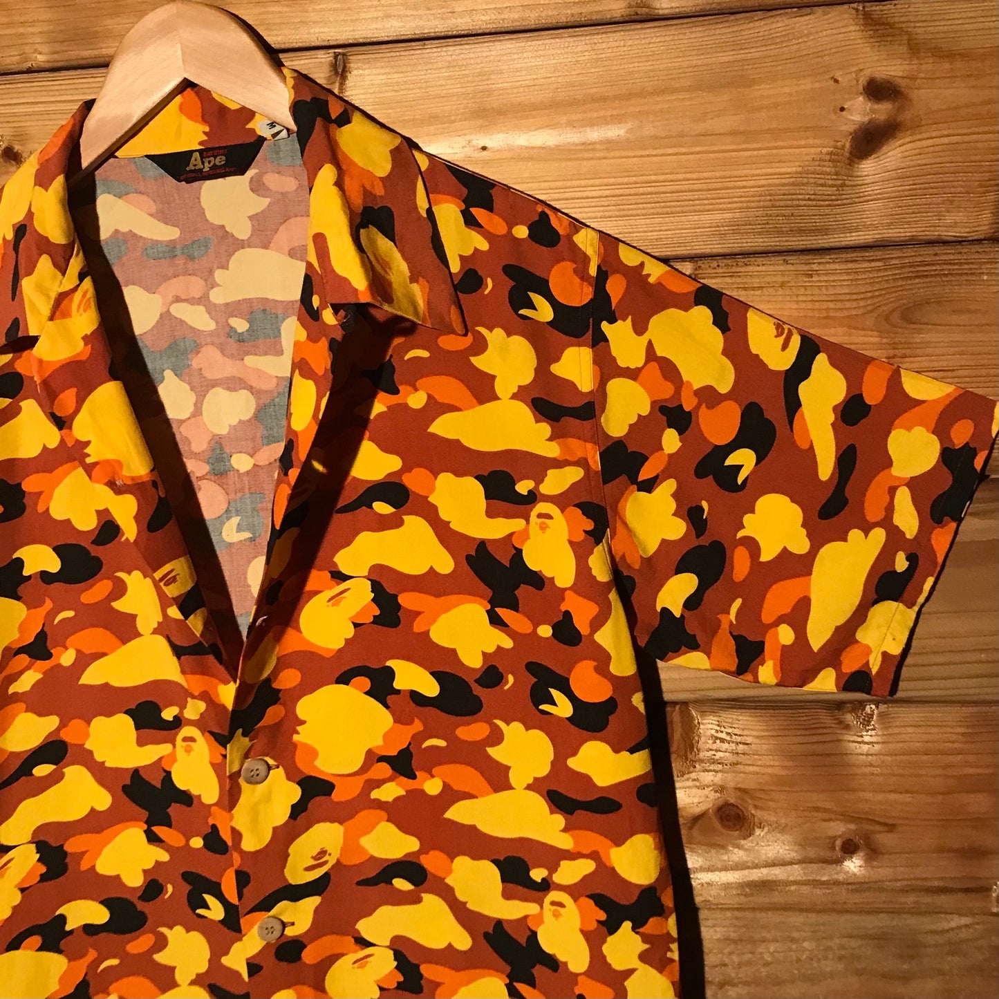 Bape, A Bathing Ape Orange Camo AOP button up shirt